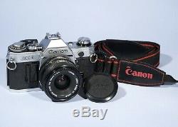Canon AE-1 35mm SLR Film Camera FD 28mm f/2.8 Lens Fully Working New Seals