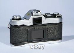 Canon AE-1 35mm SLR Film Camera FD 28mm f/2.8 Lens Fully Working New Seals