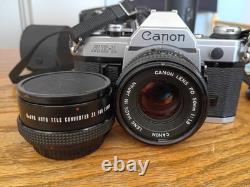 Canon AE-1 35mm SLR Film Camera, FD 50mm, FD 135mm, Doubler, Manuals, Tested
