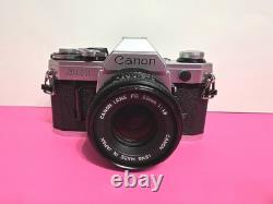 Canon AE-1 35mm SLR Film Camera With 50mm FD Film Tested & Working Great