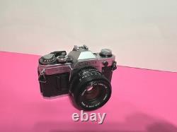 Canon AE-1 35mm SLR Film Camera With 50mm FD Film Tested & Working Great