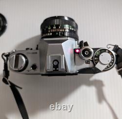 Canon AE-1 35mm SLR Film Camera with 50mm f/1.8 FD Lens, VTG Strap and more-read