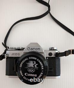 Canon AE-1 35mm SLR Film Camera with 50mm f/1.8 FD Lens, VTG Strap and more-read