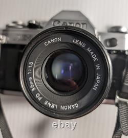 Canon AE-1 35mm SLR Film Camera with 50mm f/1.8 FD Lens, VTG Strap and more-read