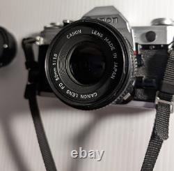 Canon AE-1 35mm SLR Film Camera with 50mm f/1.8 FD Lens, VTG Strap and more-read