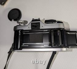 Canon AE-1 35mm SLR Film Camera with 50mm f/1.8 FD Lens, VTG Strap and more-read