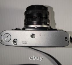 Canon AE-1 35mm SLR Film Camera with 50mm f/1.8 FD Lens, VTG Strap and more-read