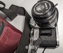 Canon AE-1 35mm SLR Film Camera with 50mm f/1.8 FD Lens, VTG Strap and more-read