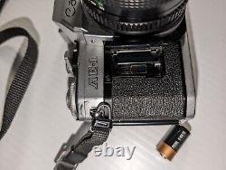 Canon AE-1 35mm SLR Film Camera with 50mm f/1.8 FD Lens, VTG Strap and more-read