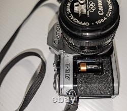 Canon AE-1 35mm SLR Film Camera with 50mm f/1.8 FD Lens, VTG Strap and more-read