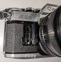 Canon AE-1 35mm SLR Film Camera with 50mm f/1.8 FD Lens, VTG Strap and more-read