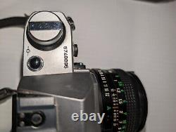 Canon AE-1 35mm SLR Film Camera with 50mm f/1.8 FD Lens, VTG Strap and more-read