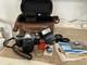 Canon AE-1 35mm SLR Film Camera with 50mm f/1.8 Lens, speed light, strap and bag