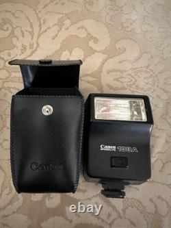 Canon AE-1 35mm SLR Film Camera with 50mm f/1.8 Lens, speed light, strap and bag