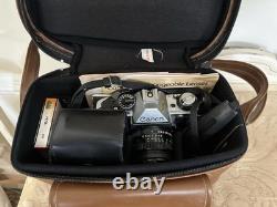 Canon AE-1 35mm SLR Film Camera with 50mm f/1.8 Lens, speed light, strap and bag