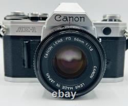 Canon AE-1 35mm SLR Film Camera with Canon 50mm f/1.8 FD Lens-Tested With Case