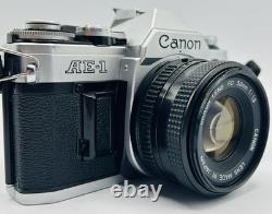 Canon AE-1 35mm SLR Film Camera with Canon 50mm f/1.8 FD Lens-Tested With Case