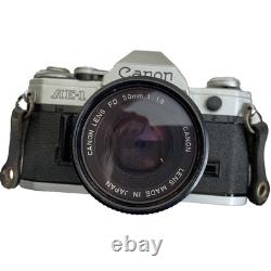 Canon AE-1 35mm SLR Film Camera with FD 50mm f/1.8 Lens Tested Working