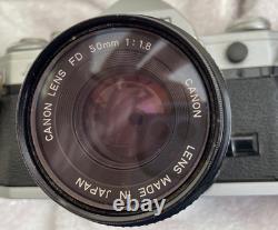 Canon AE-1 35mm SLR Film Camera with FD 50mm f/1.8 Lens Tested Working
