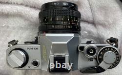 Canon AE-1 35mm SLR Film Camera with FD 50mm f/1.8 Lens Tested Working