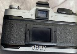 Canon AE-1 35mm SLR Film Camera with FD 50mm f/1.8 Lens Tested Working