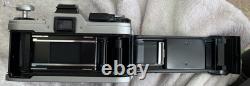 Canon AE-1 35mm SLR Film Camera with FD 50mm f/1.8 Lens Tested Working