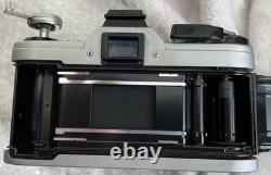 Canon AE-1 35mm SLR Film Camera with FD 50mm f/1.8 Lens Tested Working
