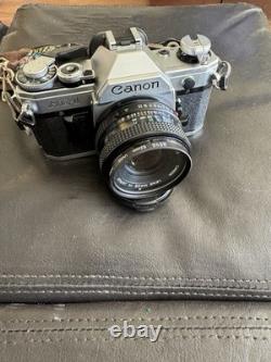 Canon AE-1 35mm SLR Film Camera with Hoya 52mm. Tested. Plus Zoom lens