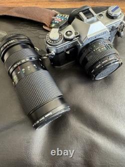 Canon AE-1 35mm SLR Film Camera with Hoya 52mm. Tested. Plus Zoom lens