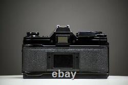 Canon AE-1 Black 35mm Film Camera with Canon 50mm f/1.8 Lens SLR Tested