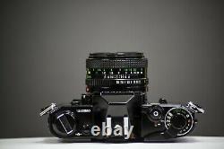 Canon AE-1 Black 35mm Film Camera with Canon 50mm f/1.8 Lens SLR Tested