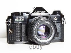 Canon AE-1 Program 35mm SLR Film Camera With 50mm FD Film Black TESTED
