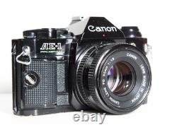 Canon AE-1 Program 35mm SLR Film Camera With 50mm FD Film Black TESTED