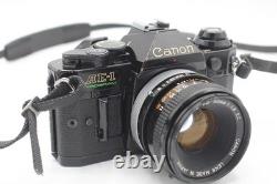 Canon AE-1 Program 35mm SLR Film Camera with 1.8 Lens Sr. 2224824 Refurbished