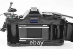 Canon AE-1 Program 35mm SLR Film Camera with 1.8 Lens Sr. 2224824 Refurbished