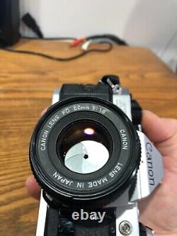 Canon AE-1 Program 35mm SLR Film Camera with 50mm 11.8 Lens, Canon Flash, Motor
