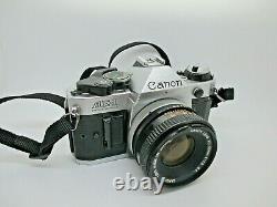 Canon AE-1 Program 35mm SLR Film Camera with 50mm f/1.8 FD Lens GREAT CONDITION