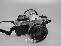Canon AE-1 Program 35mm SLR Film Camera with 50mm f/1.8 FD Lens WORKING PERFECT