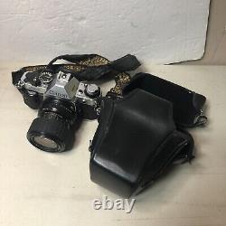Canon AE-1 Program 35mm SLR Film Camera with Sigma 35-70mm lens & Leather Case