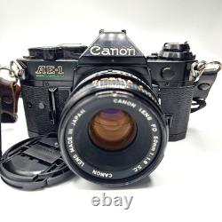 Canon AE-1 Program Black SLR Film Camera with Canon 50mm f/1.8 Lens, Tested