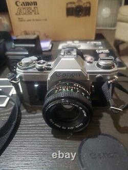 Canon AE-1 Program SLR 35mm Film Camera FD 50mm f1.8 Lens All Accessories