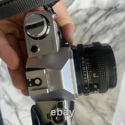 Canon AE-1 Silver SLR 35mm Film Camera FD 50mm f/1.8 Lens FROM JAPAN Tasted