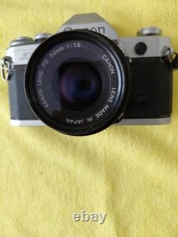 Canon AE-1 Silver SLR Film Camera with FD 50mm f/1.8 Lens