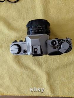 Canon AE-1 Silver SLR Film Camera with FD 50mm f/1.8 Lens
