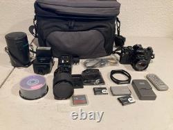 Canon A-1 35mm SLR Film Camera Black with 2X Lens, Bag, Flash & Accessories