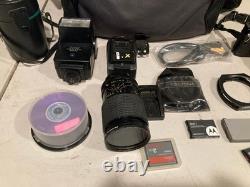 Canon A-1 35mm SLR Film Camera Black with 2X Lens, Bag, Flash & Accessories