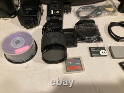 Canon A-1 35mm SLR Film Camera Black with 2X Lens, Bag, Flash & Accessories