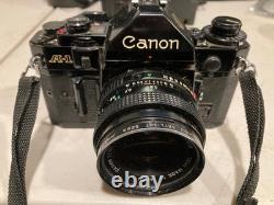 Canon A-1 35mm SLR Film Camera Black with 2X Lens, Bag, Flash & Accessories