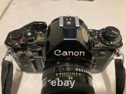 Canon A-1 35mm SLR Film Camera Black with 2X Lens, Bag, Flash & Accessories