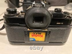 Canon A-1 35mm SLR Film Camera Black with 2X Lens, Bag, Flash & Accessories